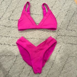 One one swimsuit size medium top and small bottoms